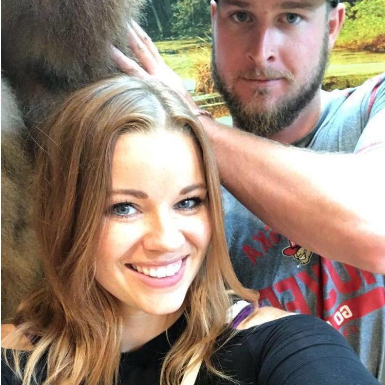 Gus and I's first photo ever together. Our first date. We went to Scheels to look for fishing lures for his dad after we had dinner. Tried to take a selfie in front of a stuffed bear.