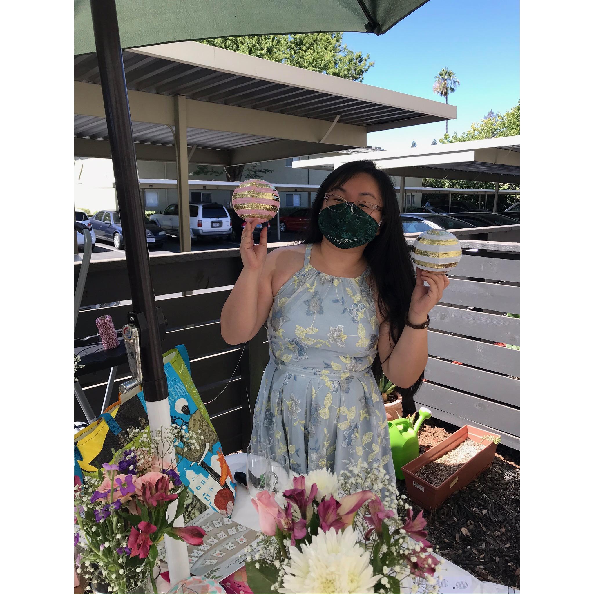Maid of Honor Emily Chirk decorating the patio