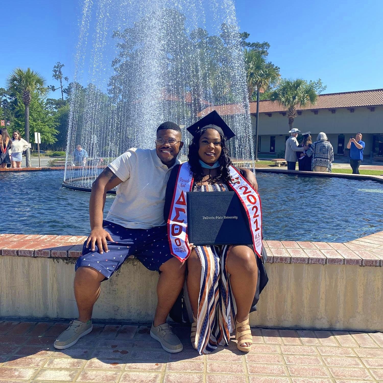 She got the degree. He was right there clapping the loudest.