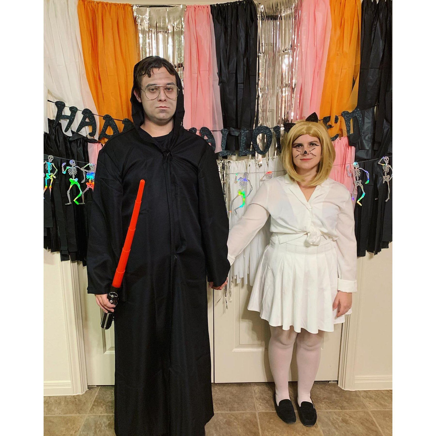 First Halloween together and the beginning of our top tier couples costumes. Here we are as Dwight and Angela from The Office on Halloween.