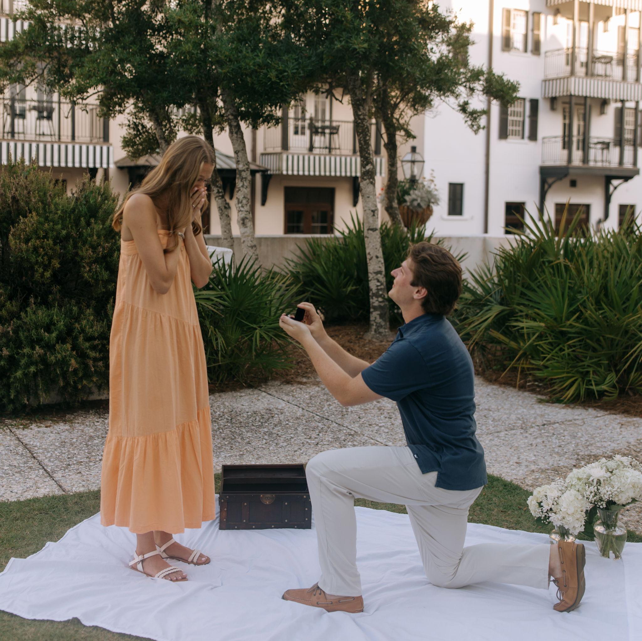 HE POPPED THE QUESTION, SHE SAID YES!!