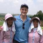 Play Golf with 2 Caddies