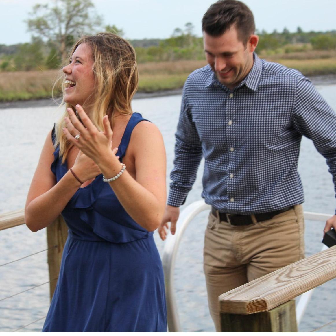 Georgia Mae looking up at her family after the proposal. Pure joy.