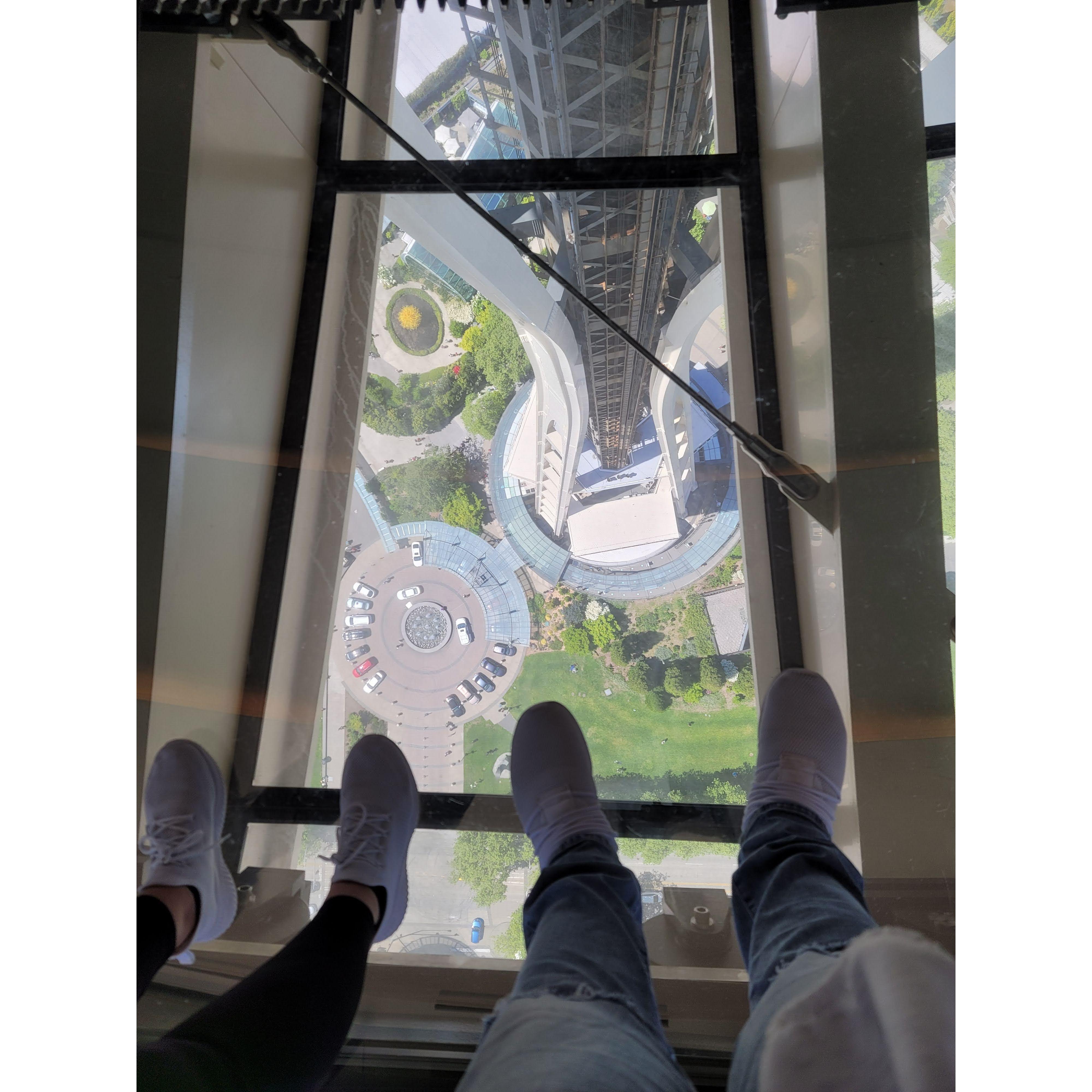 Caroline's 27th Birthday trip to Seattle, Washington our feet looking down from the top of the space needle