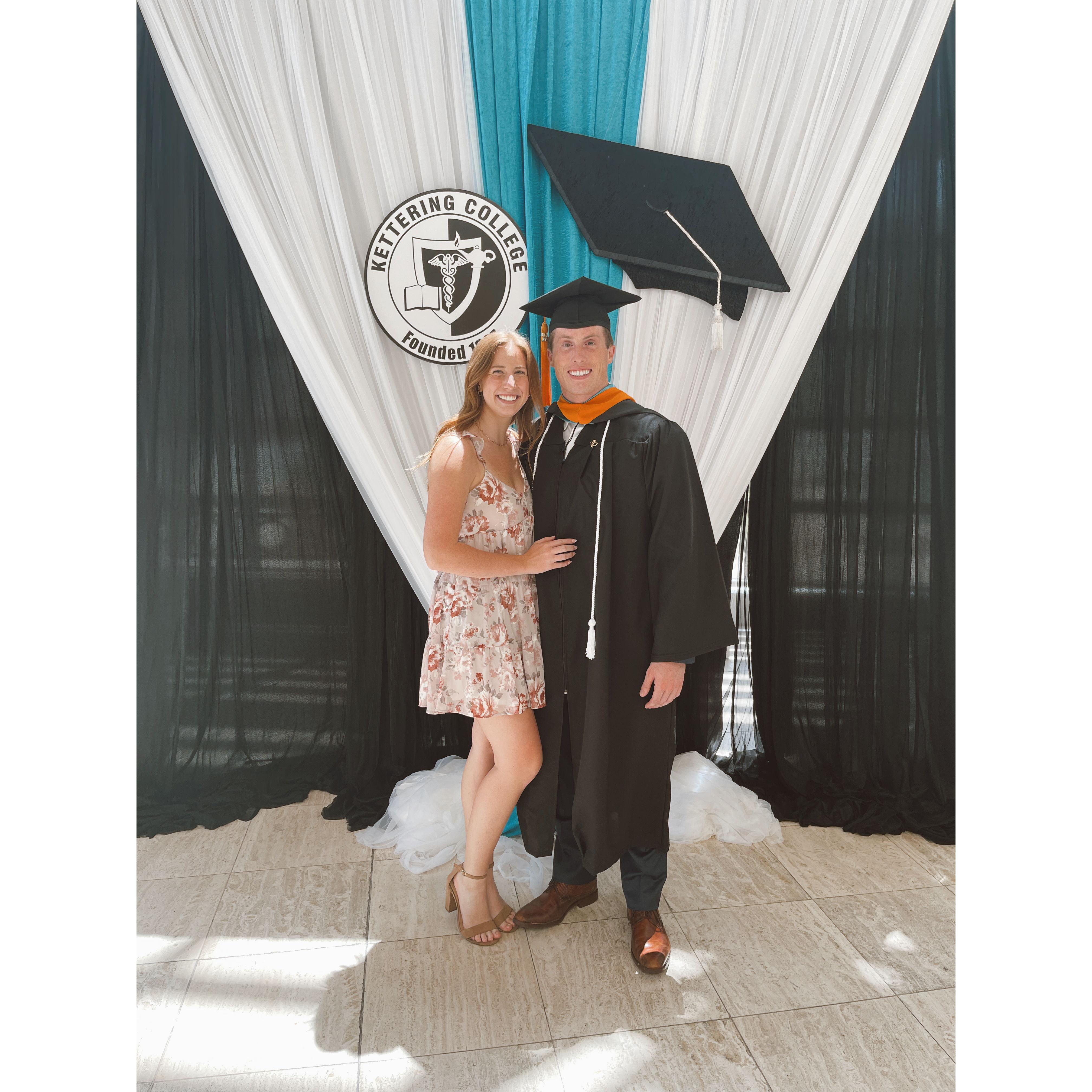 Us at John's nursing school graduation, July 2023