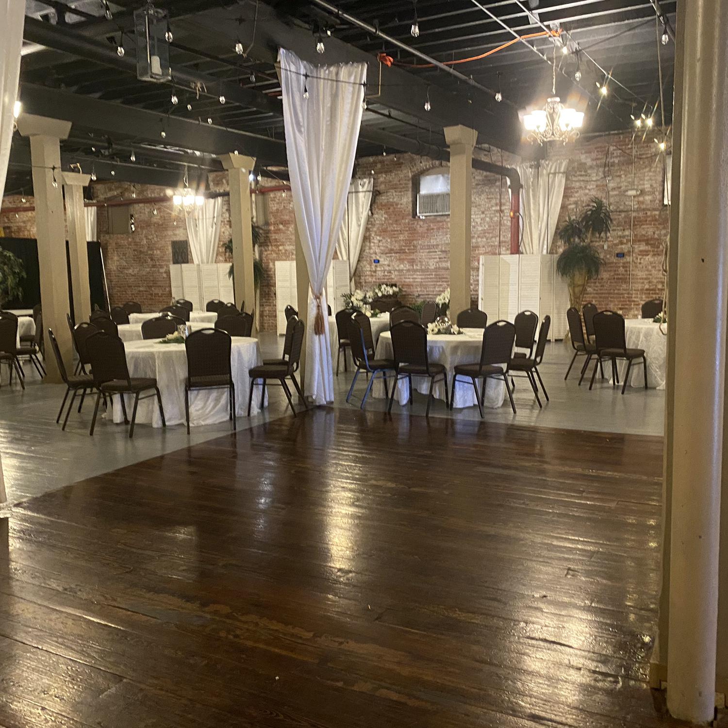 The venue: dance floor and some of the tables for guests.