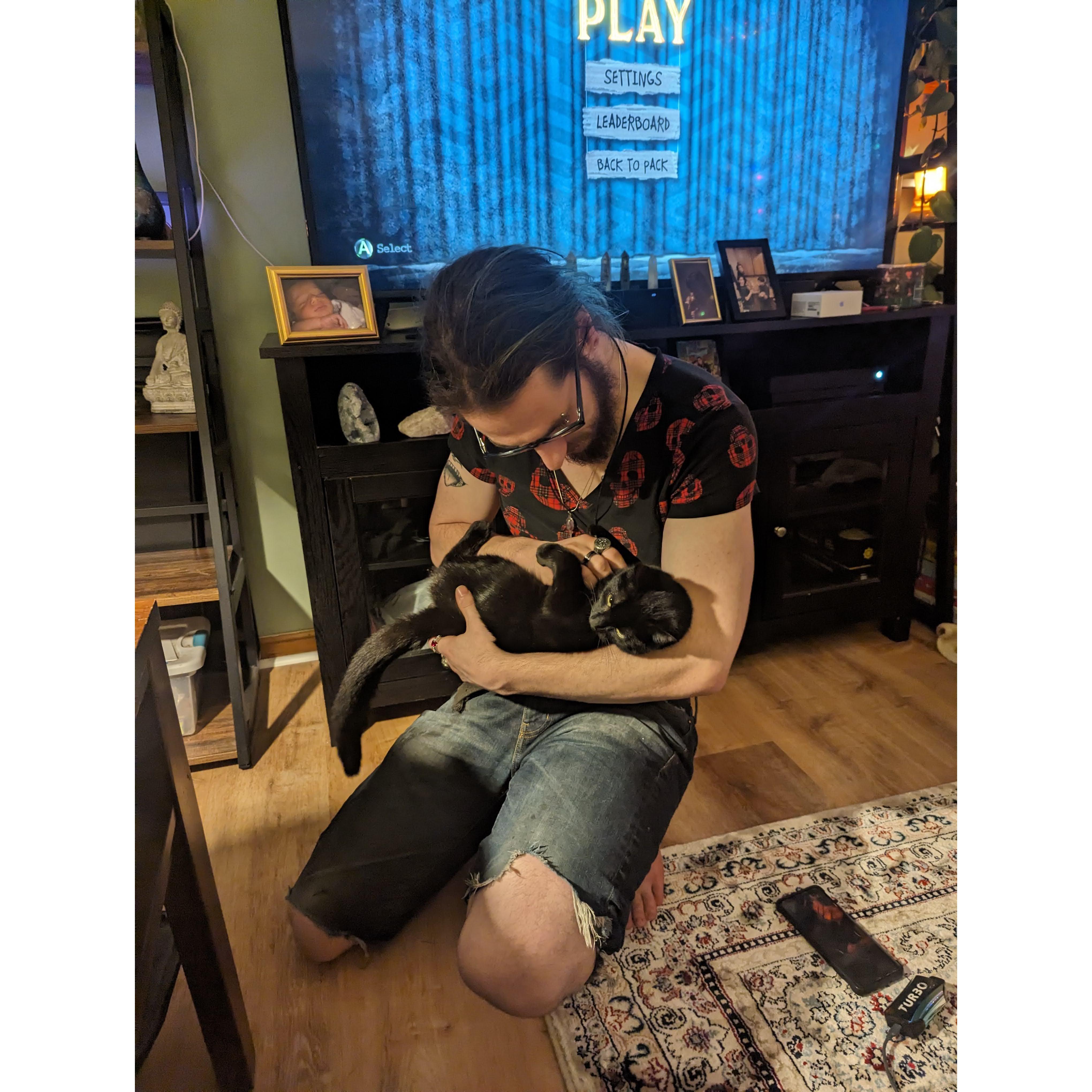 One of many images of Blaise loving cats more than Nadia.