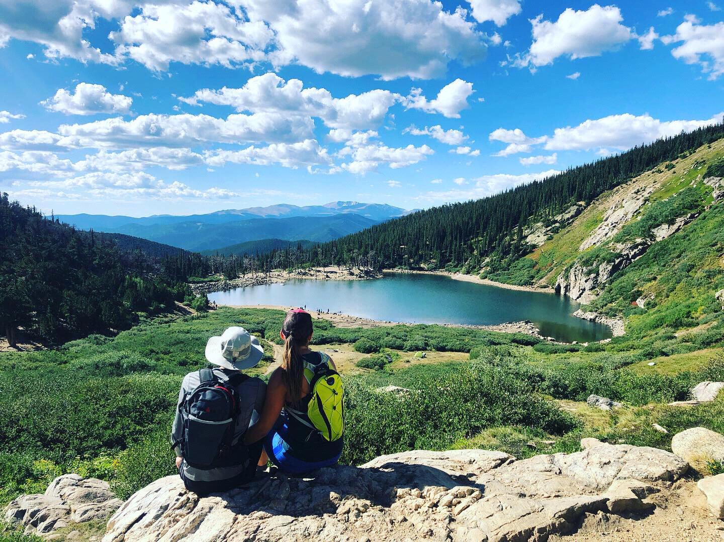 Soaking up their love of the outdoors at St. Mary's Glacier outside Denver, CO.