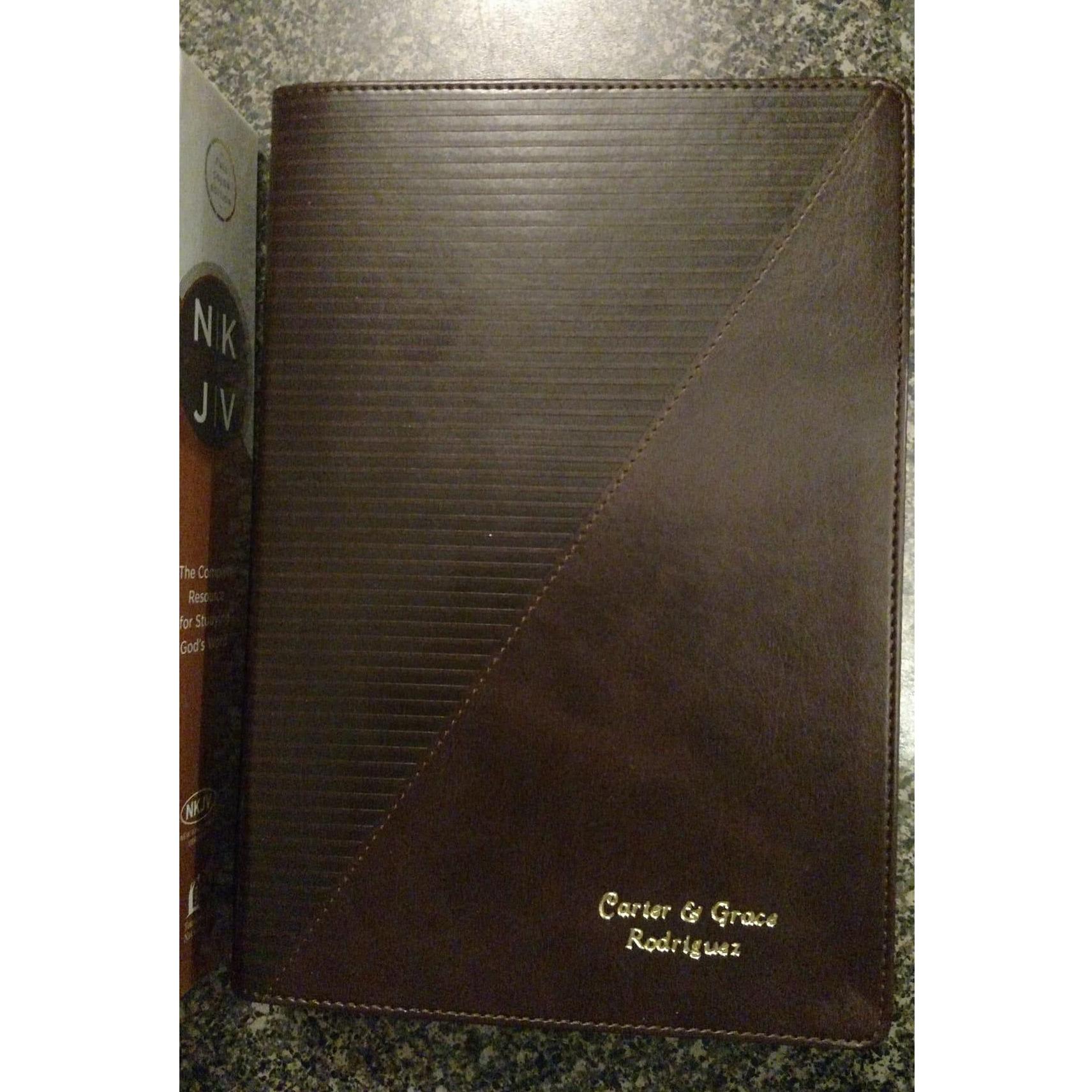We then began walking around the lake. His parents met us part way, and gave us a Bible that Carter had picked out to be our family Bible. He had our names engraved on the front of it.
