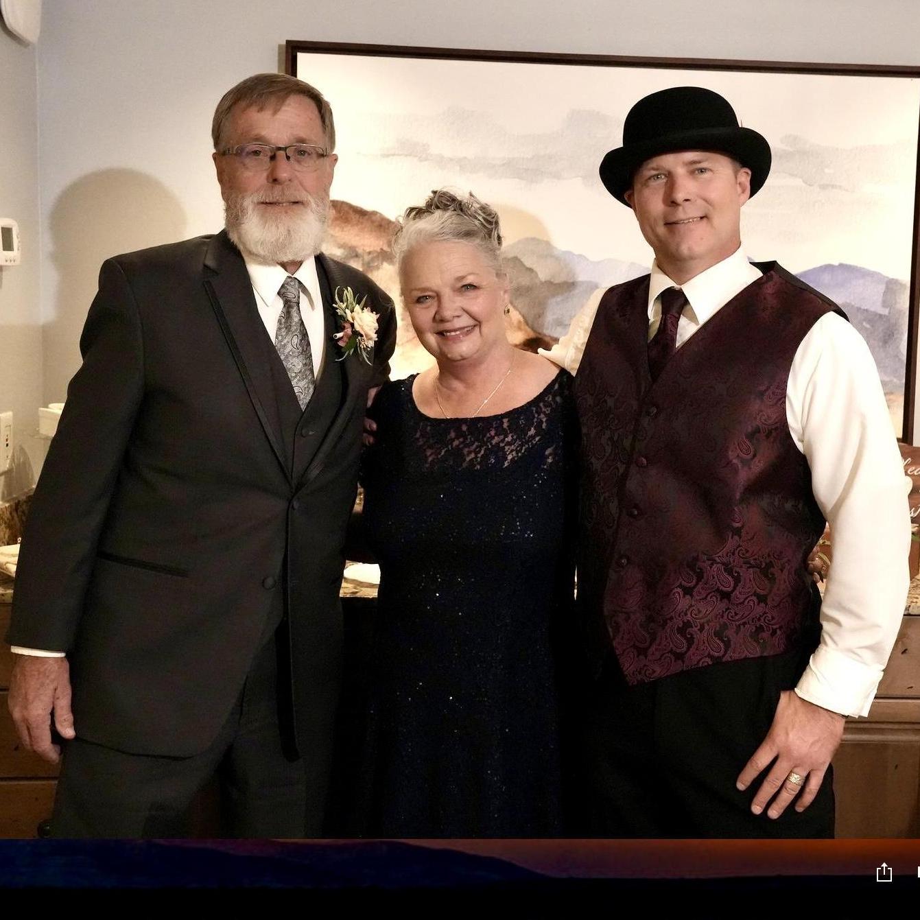 The Groom and his parents, Larry Mitchell and Kathy Erickson