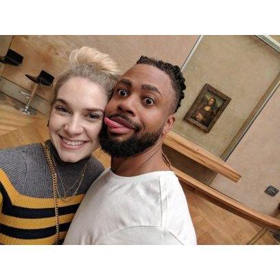 Silly faces in front of the oh so serious Mona Lisa