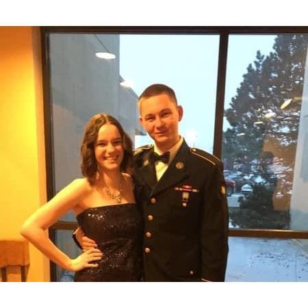 About six months after we started dating, Noah took Elisabeth to a military ball.