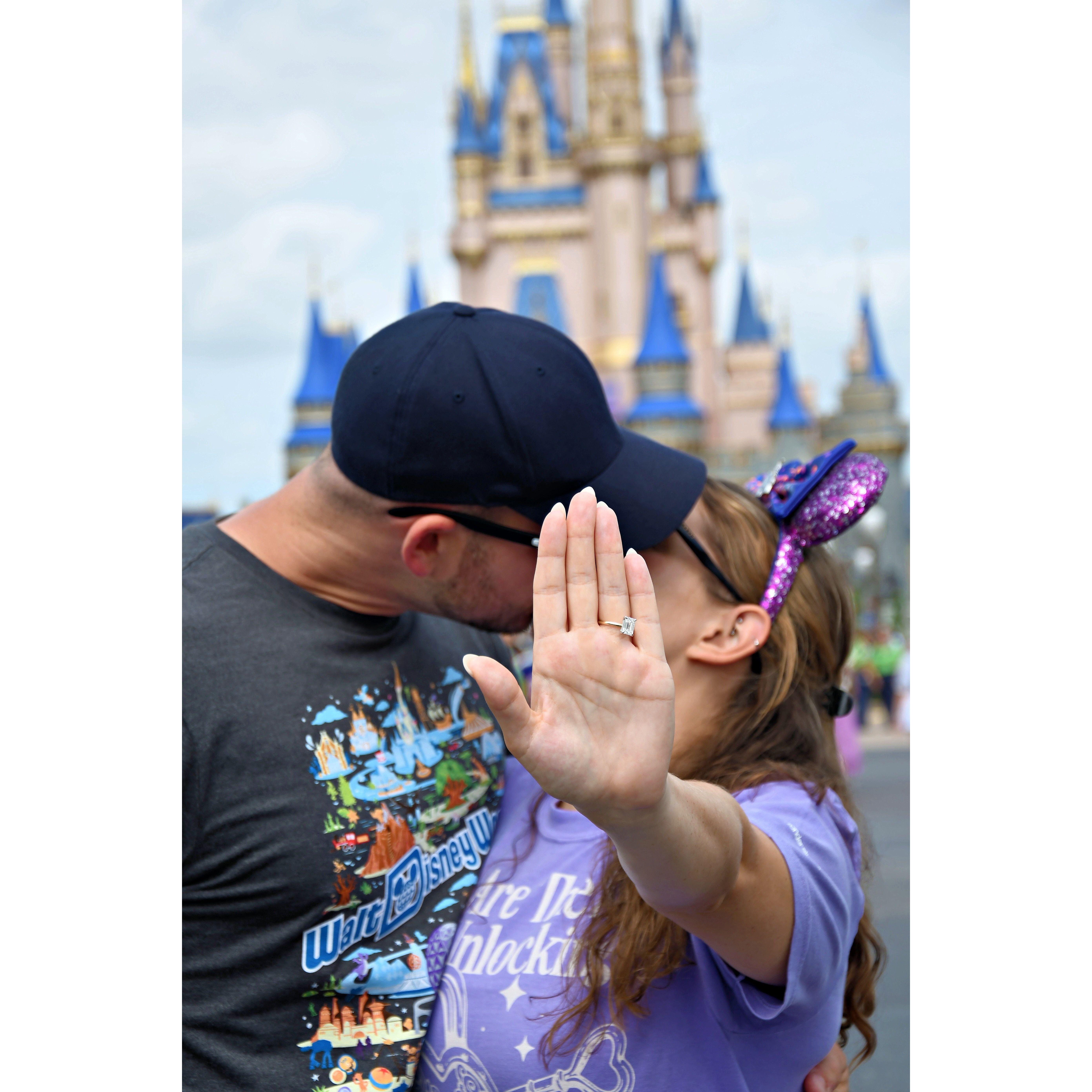 Celebrating our engagement in Magic Kingdom