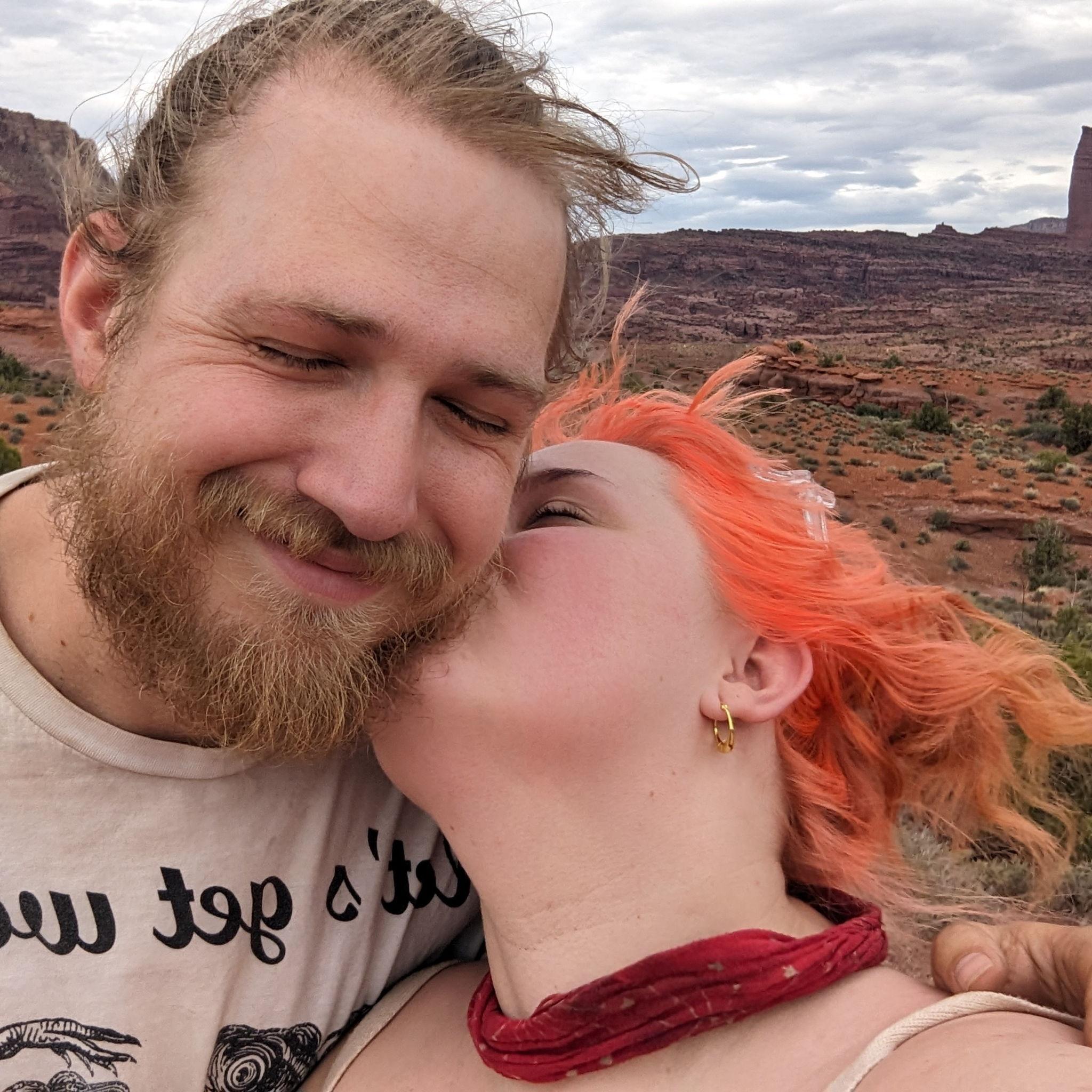 Smooching in Moab, Utah during a very hot camping trip.