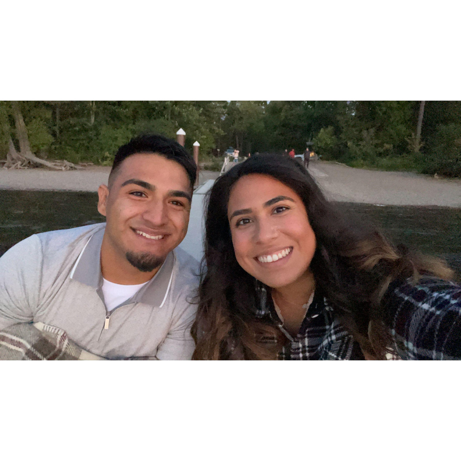 Moment right before our engagement, ft. our photographer in the back.