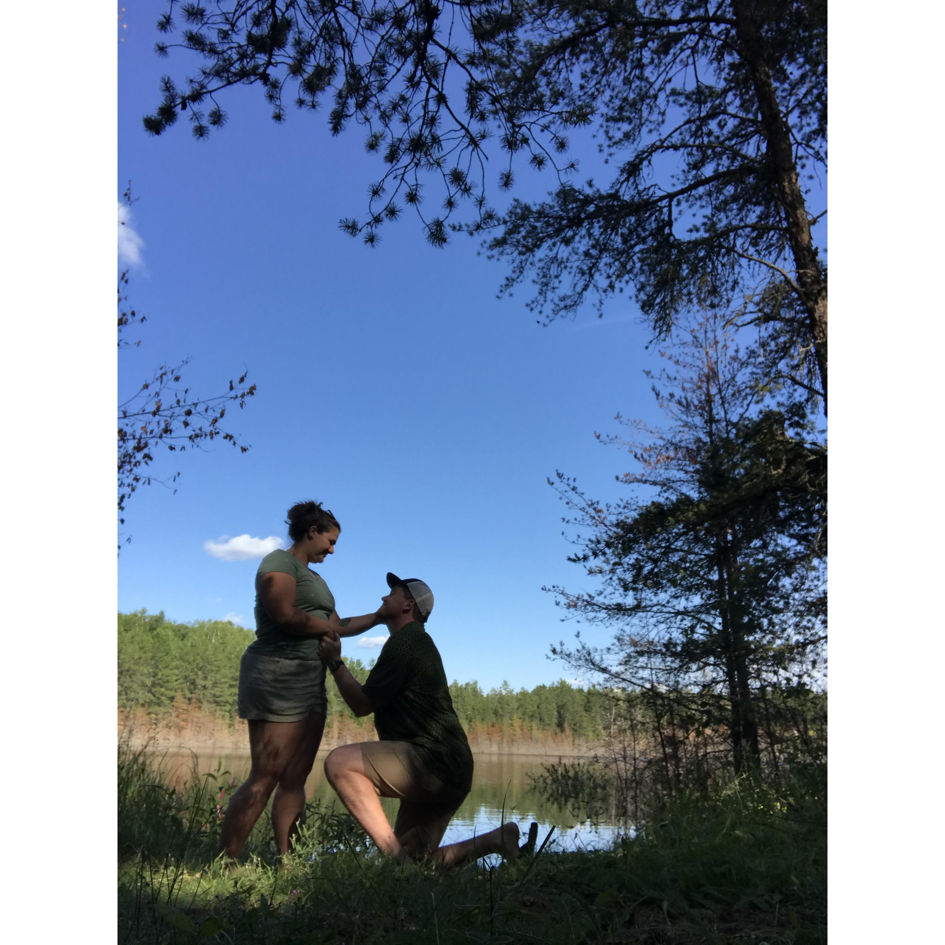 John proposing on "Love" Lake at his Mom's cabin in WI.