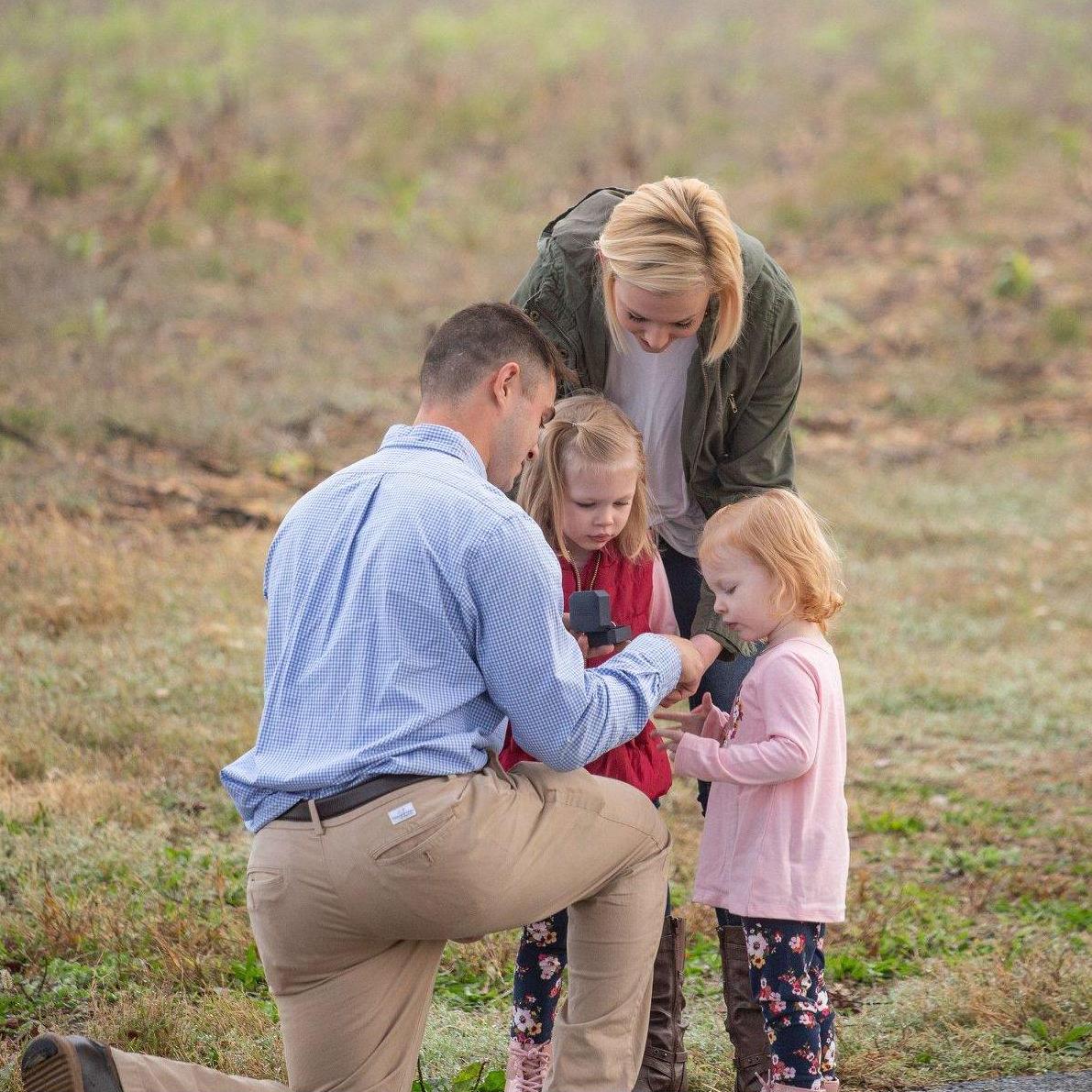Arthur giving the girls their rings.