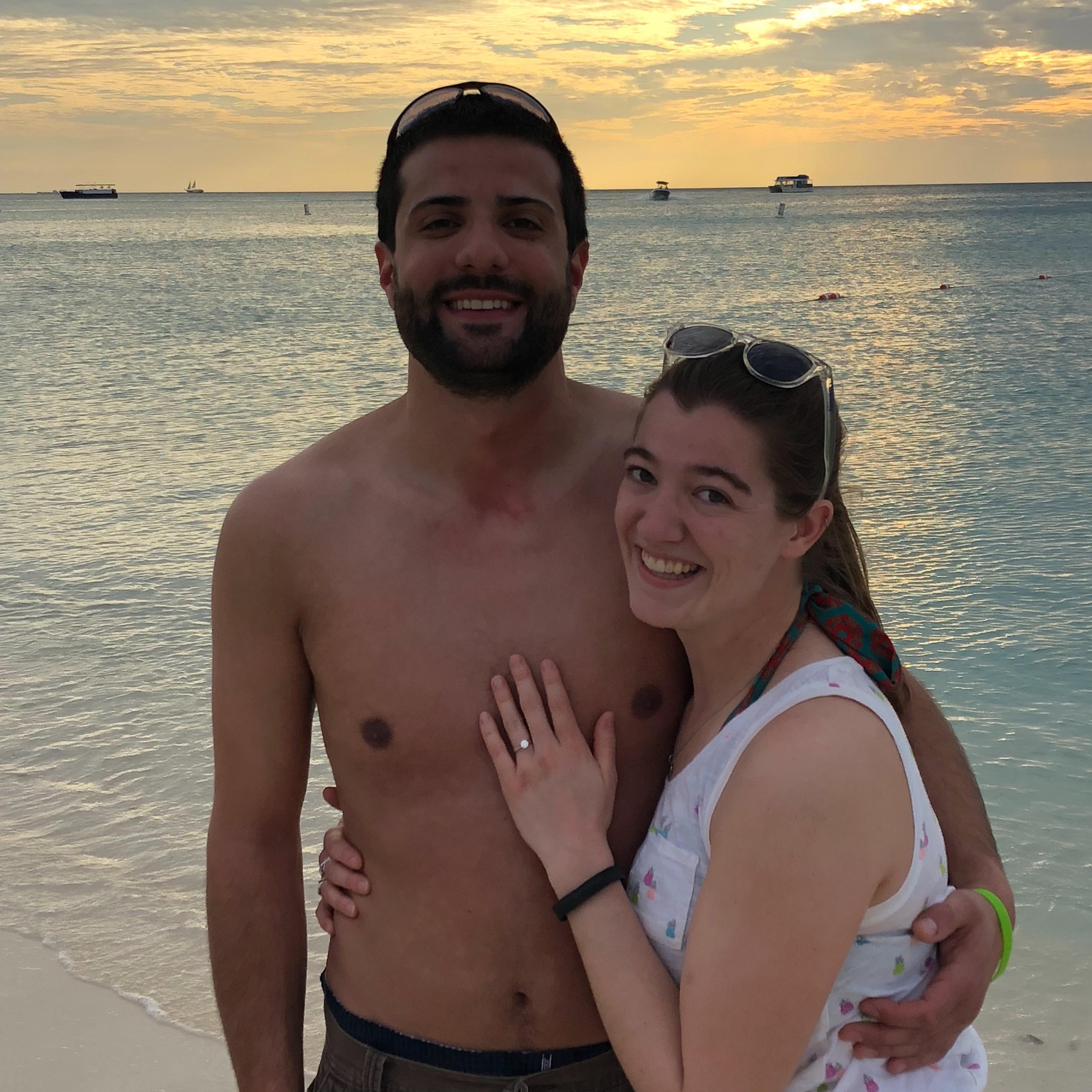 On the beach at sunset, the perfect place for a proposal!