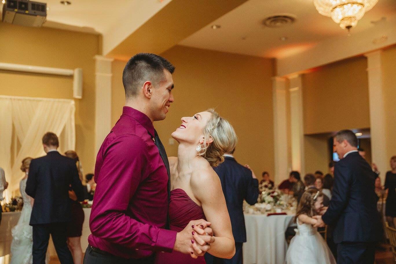 enjoying a slow dance at a wedding of one of Jillian's bridesmaids, Kelsey