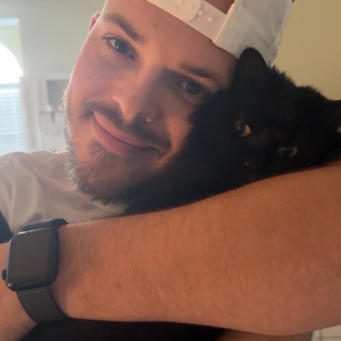 Brett and our cat, Nala girl.