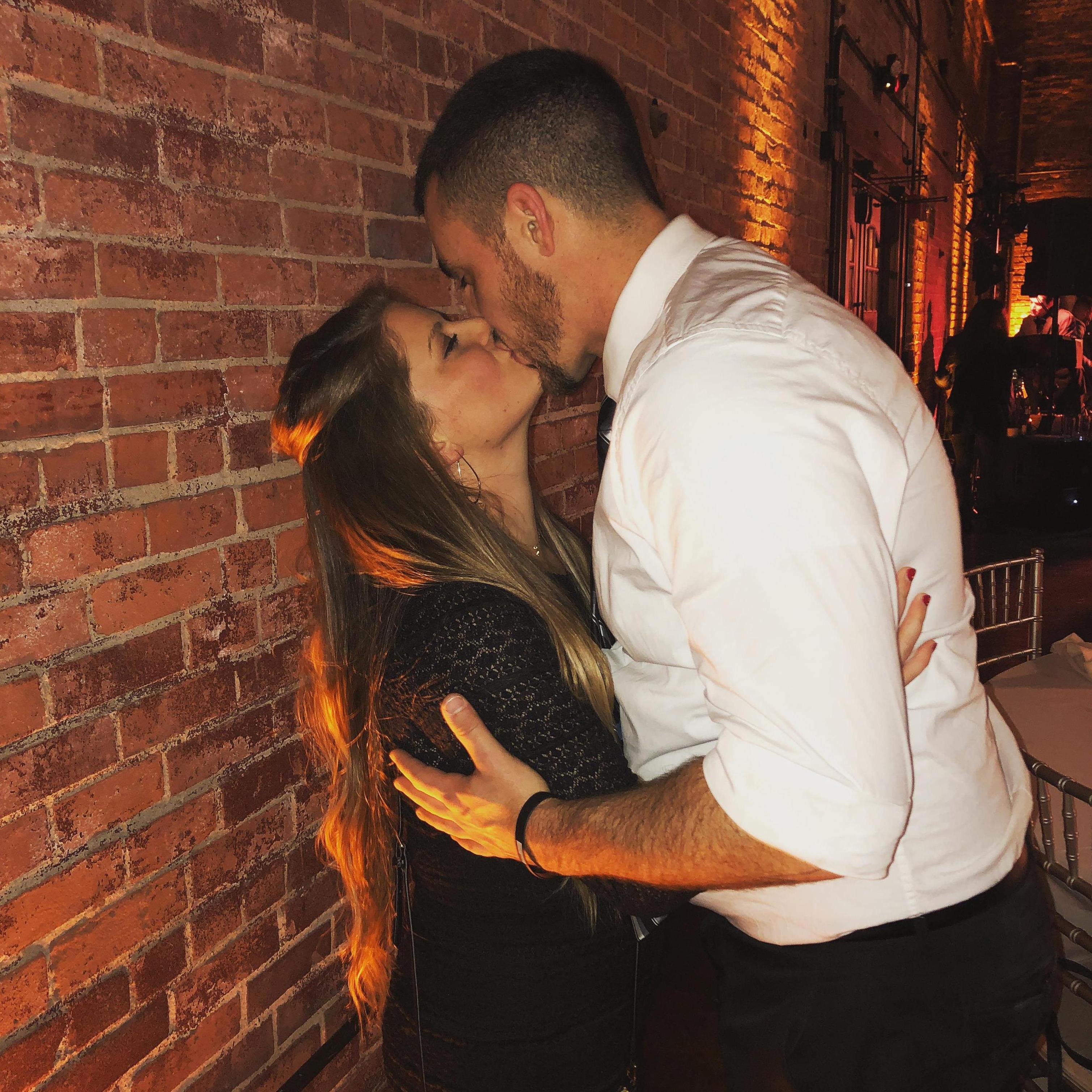 Kisses by the bricks