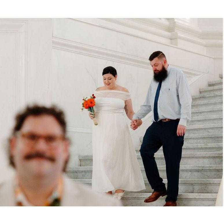 Bride is escorted by her brother, Justin