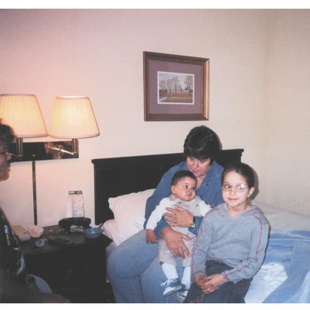 Alexis, her mom Monica, grandma Zondra, and brother Nicolas hanging out (2001)