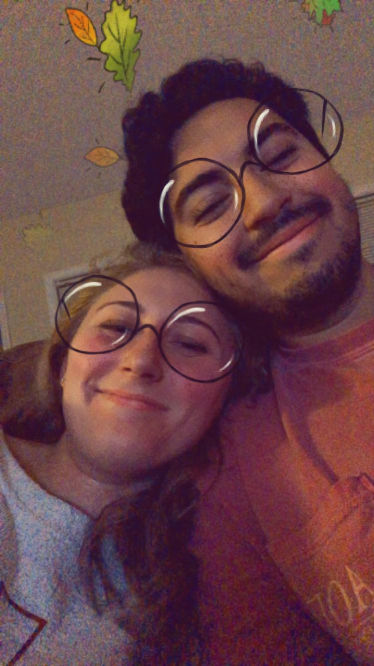 Esteban and Mallory being goofy with Snapchat filters
