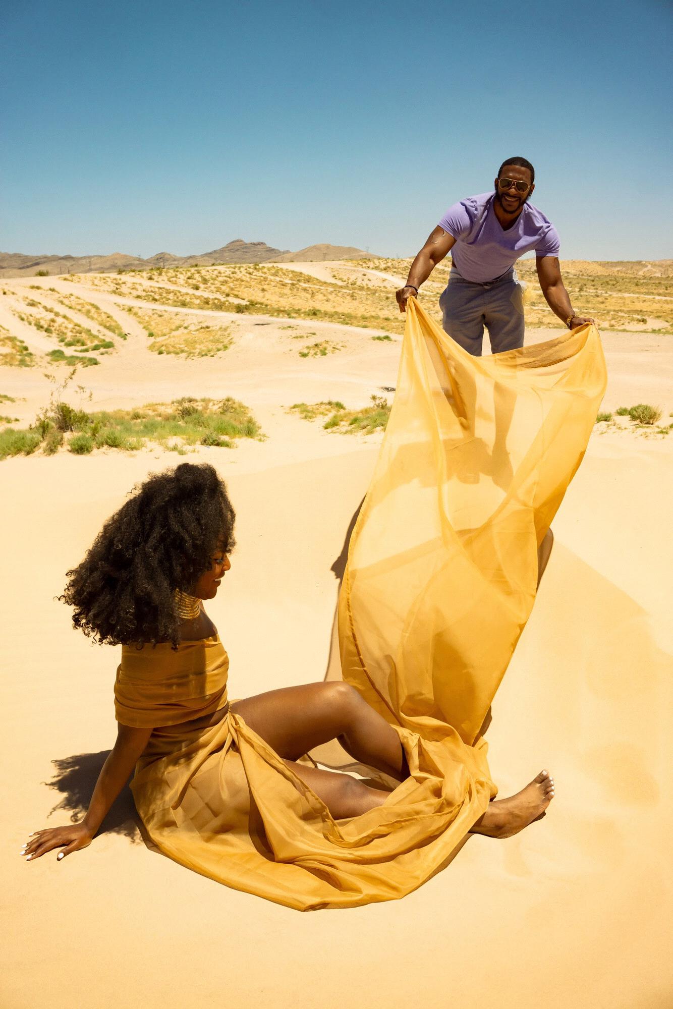 Joe assisting and supporting Leticia during a photo shoot