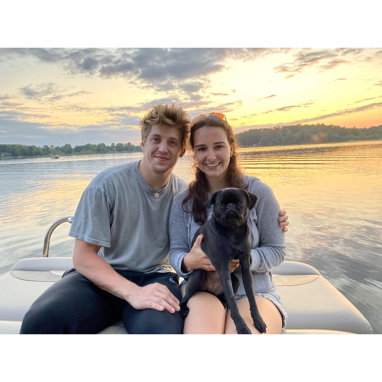 Junie also loves their trips to MI, especially the pontoon boat!