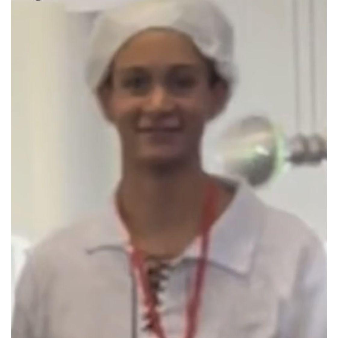 Isaiah in the background of Grace’s challenge video— July 2022
