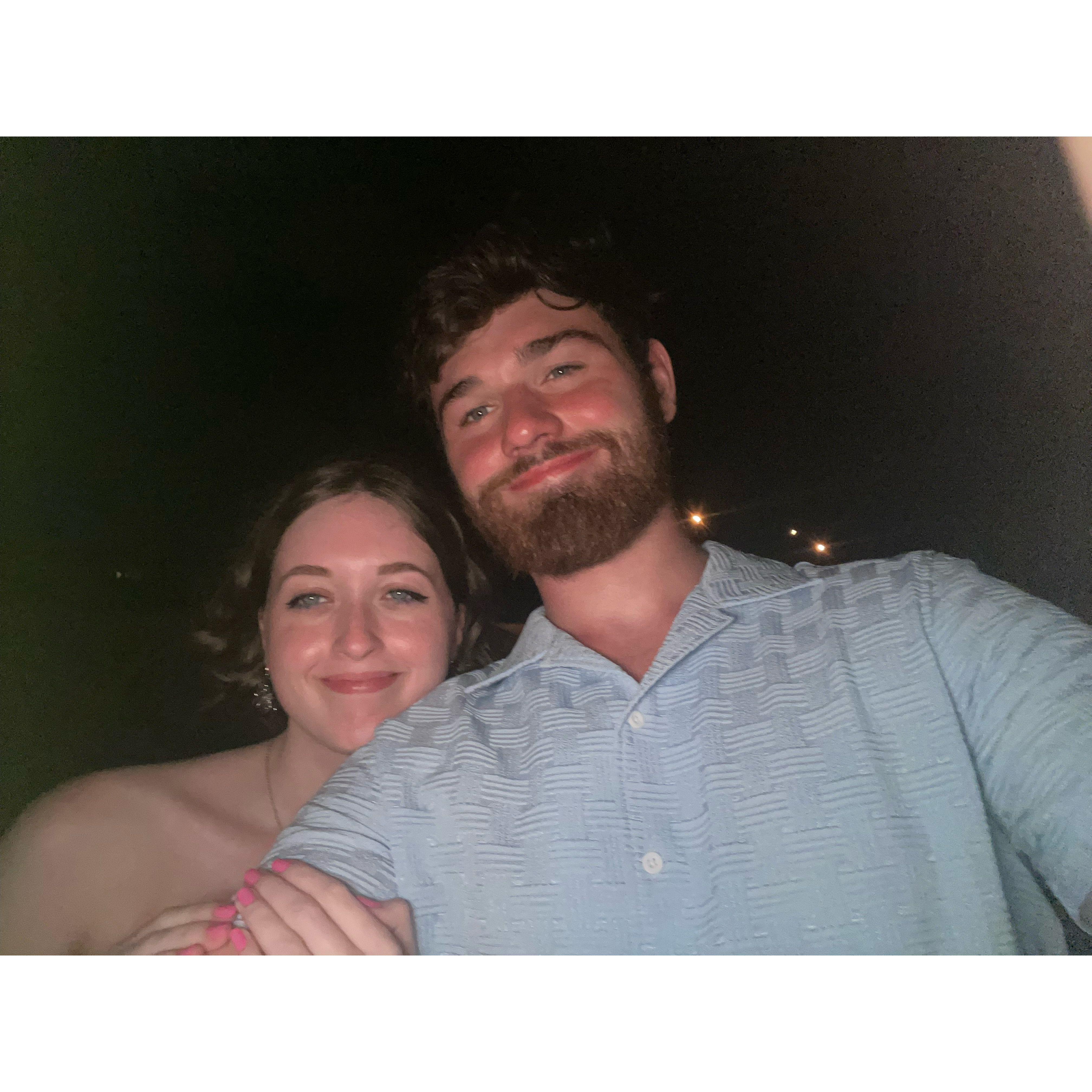 Us enjoying our first beach trip together (planning our wedding already)