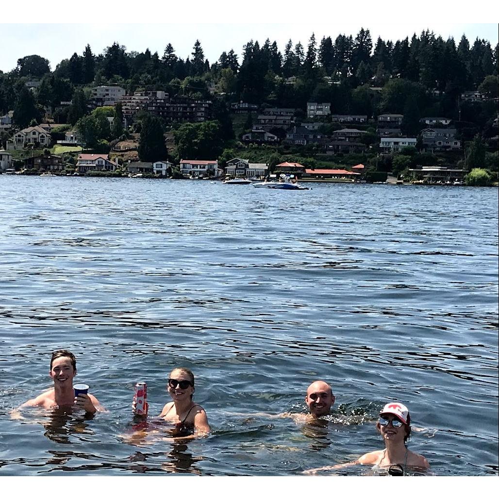 Enjoying some time in the lake with Best Man, Derek (far right) and Bridesmaid, Meghan (far left)! July 2019