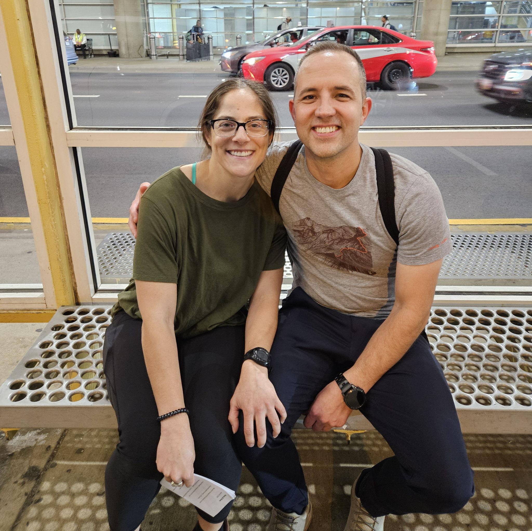 Us at the airport in the same place I first asked Ashleigh if she wanted "hang out sometime," two months later.