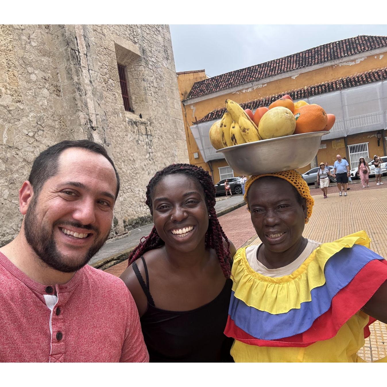 June 2024: Posing with a Palenquera in Cartagena, Colombia!