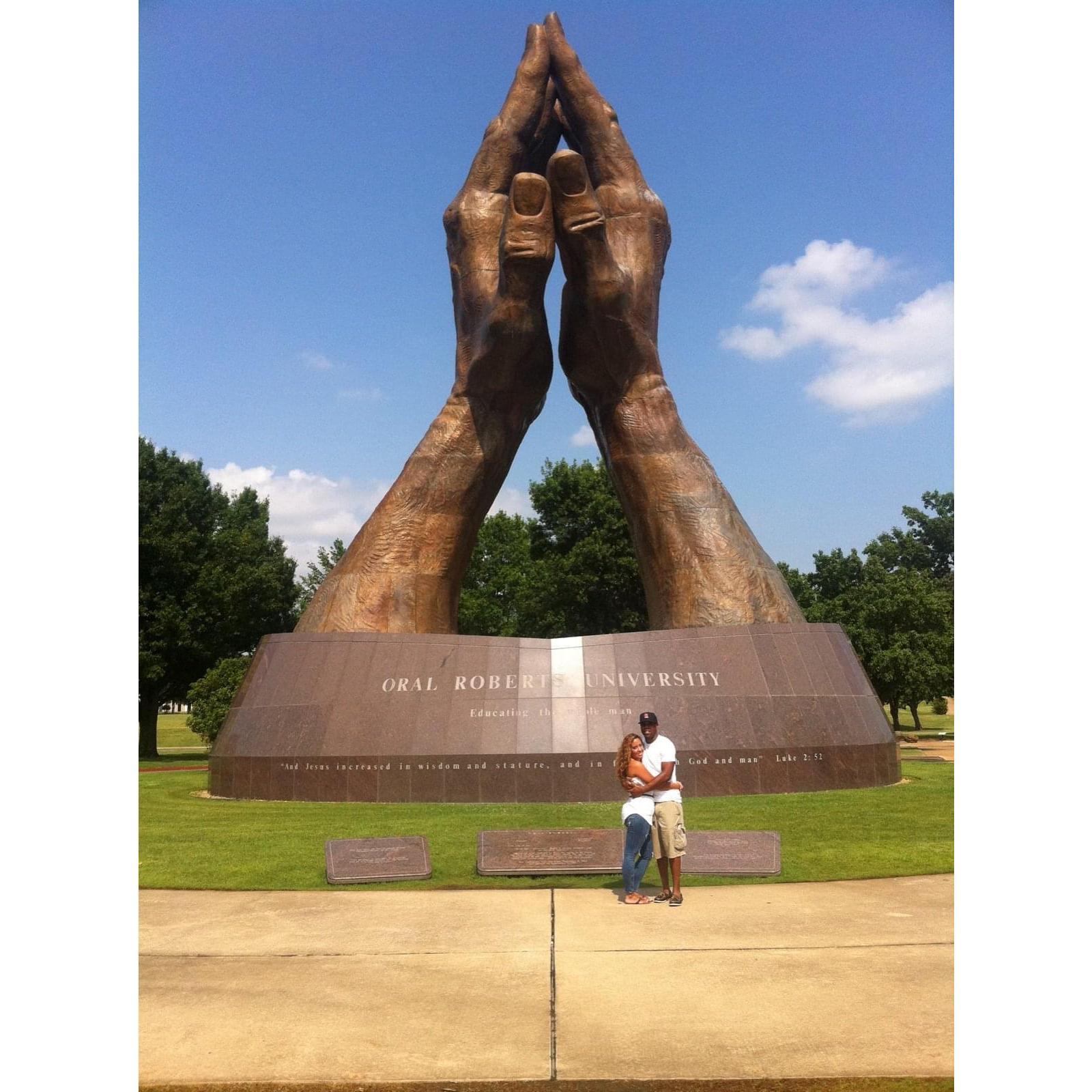 A time Melanie flew into OK and we took a picture at Oral Roberts University in front of the praying hands. The college Mel’s high school friend Maxine attended, which Mel opted out of. Look at God!