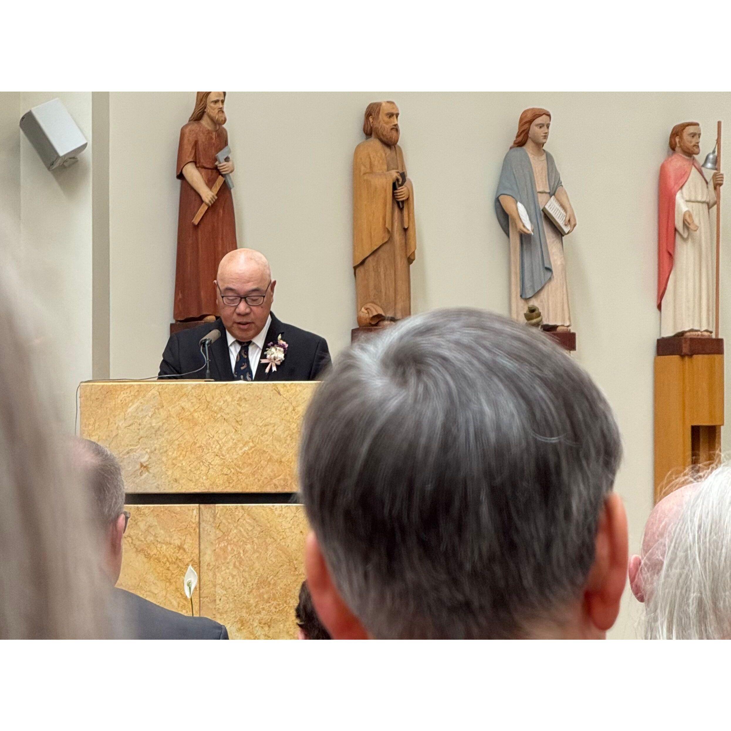 Ted does the 1st reading from the Bible.