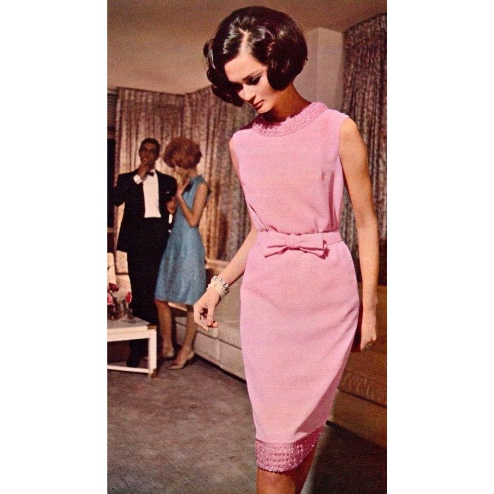 Pink will fit the color scheme perfectly and a chic cocktail dress is on theme!