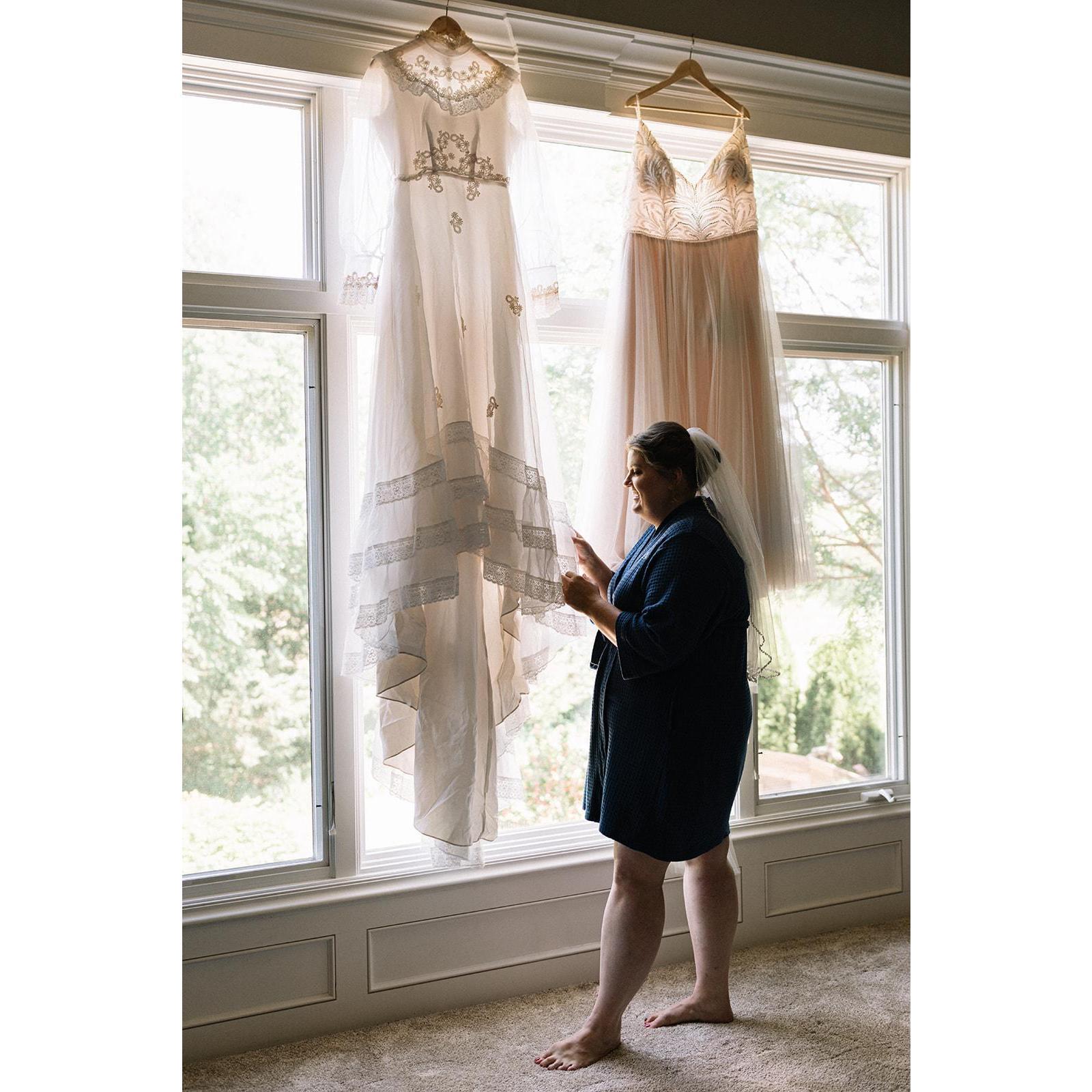 Mother of the Bride's wedding dress from 1985 on the left. Bride's dress on the right.