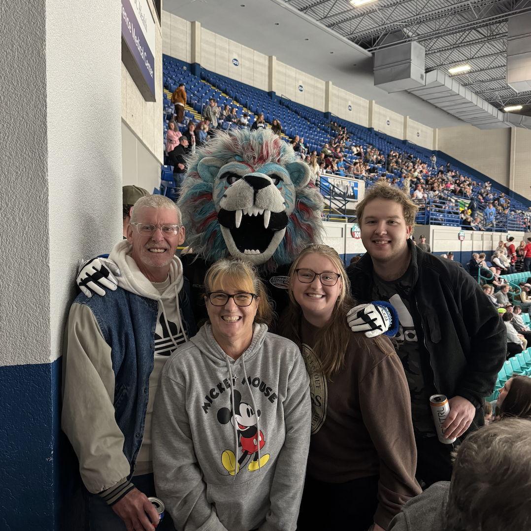 Ice Cats Hockey game with Coby's parents, Courtney and Daphne