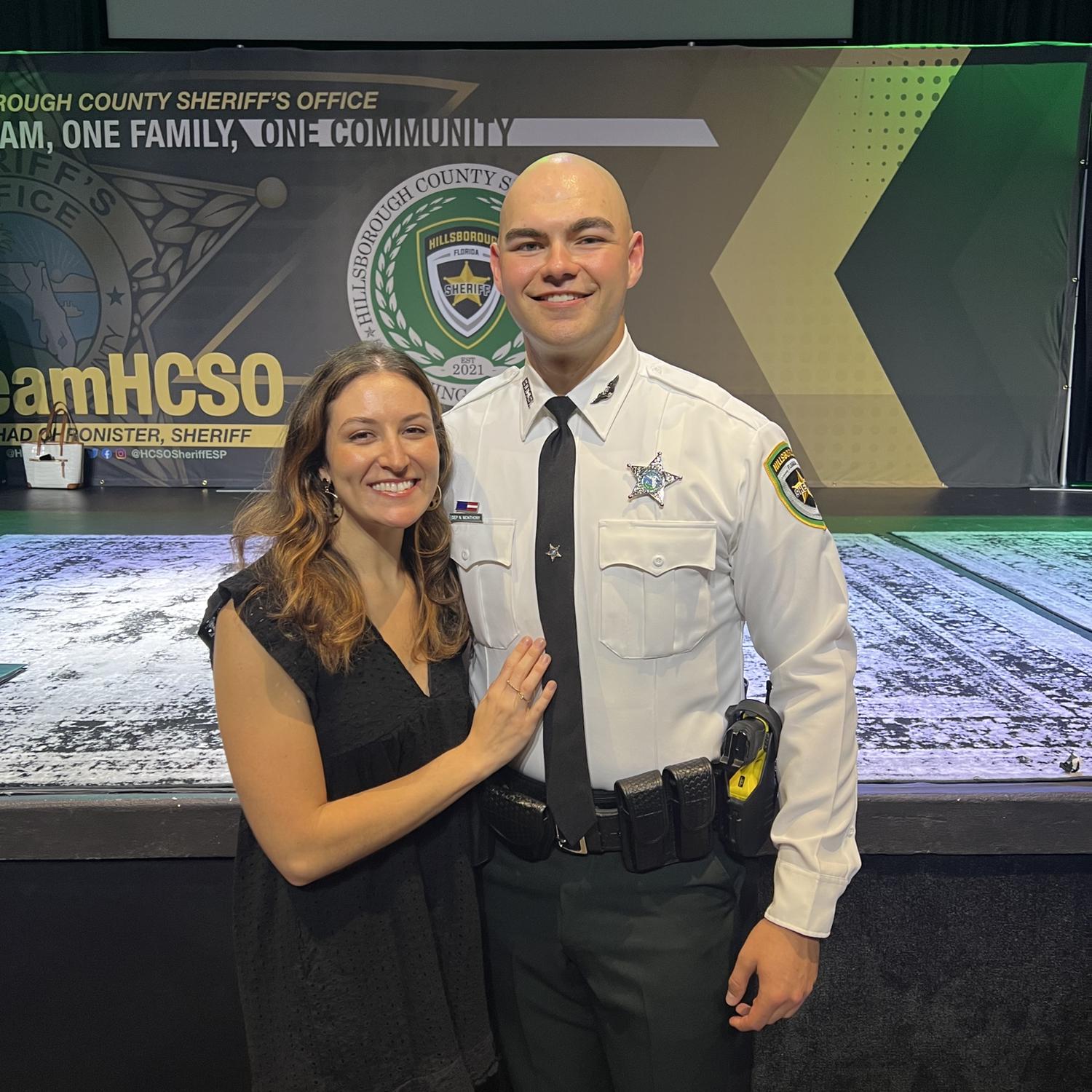 After many study dates, Nathan graduated from the Police Academy!