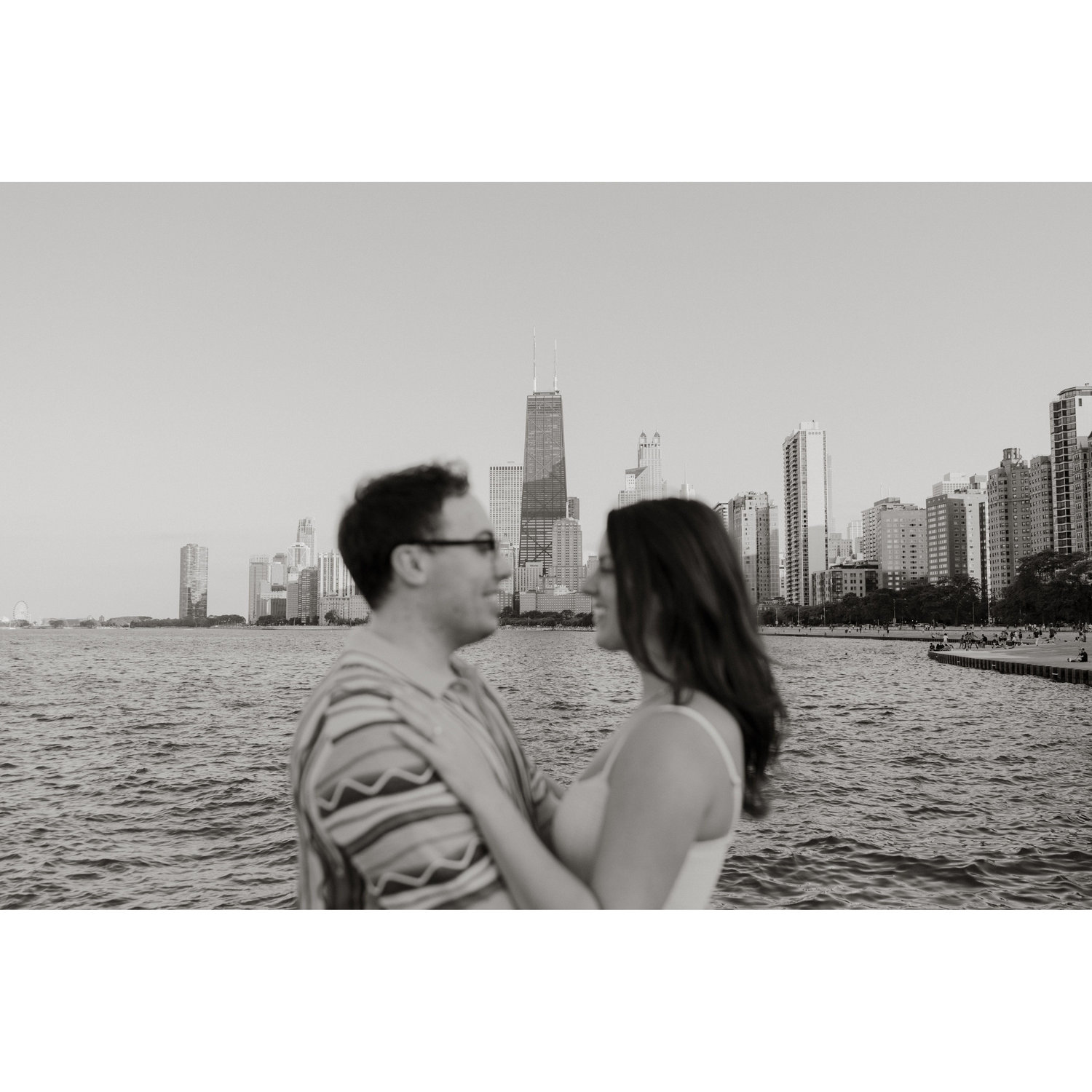 Engagement photo shoot on the lake front.