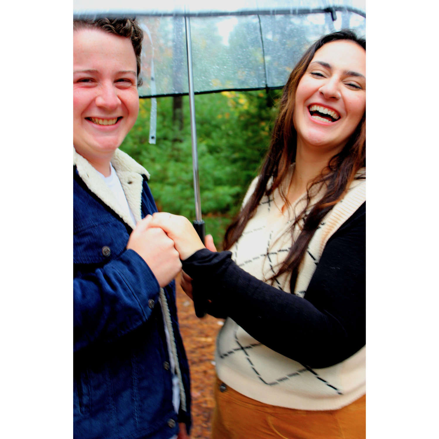 It happened to be rainy the day we had our engagement shoot. That didn't stop us from having a great time!