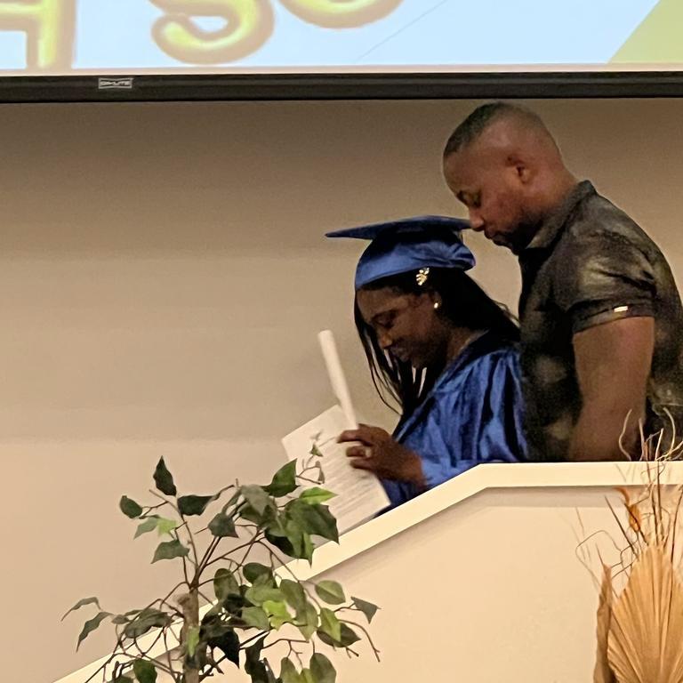 Hubby Pinning me at my RN pinning ceremony