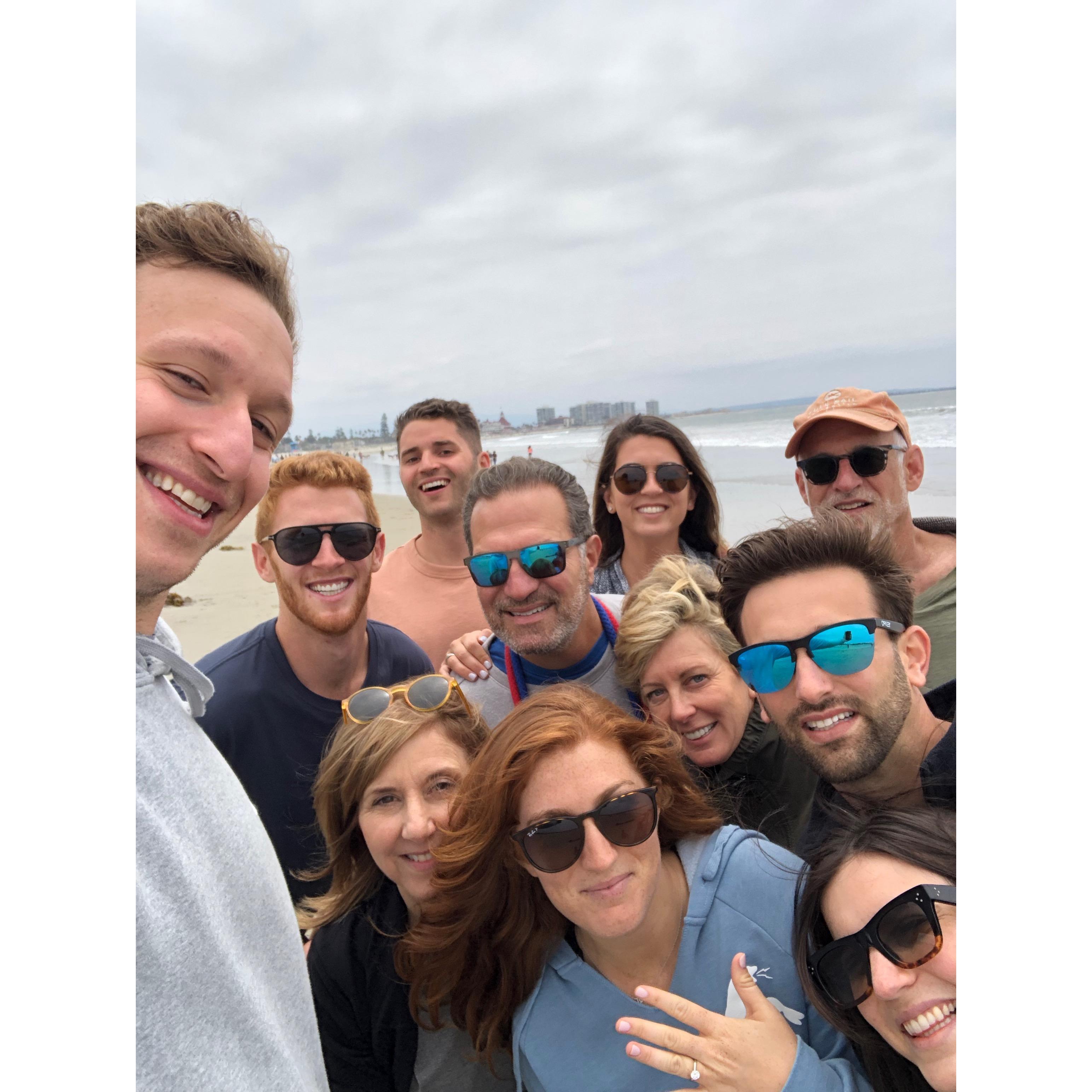Fam walks on the beach