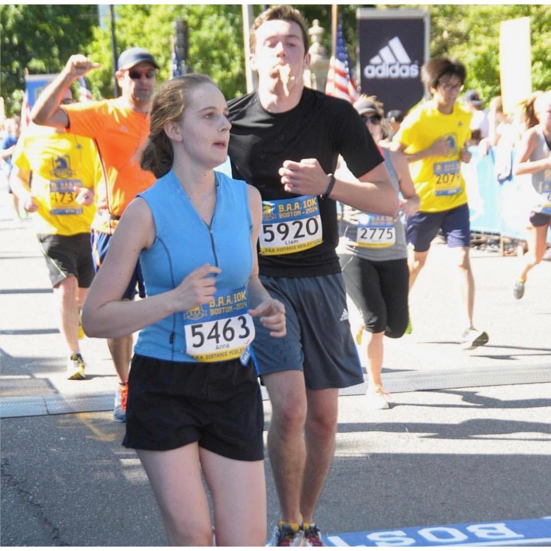 Liam throwing up on Anna at the B.A.A. 10k finish line. (2014)