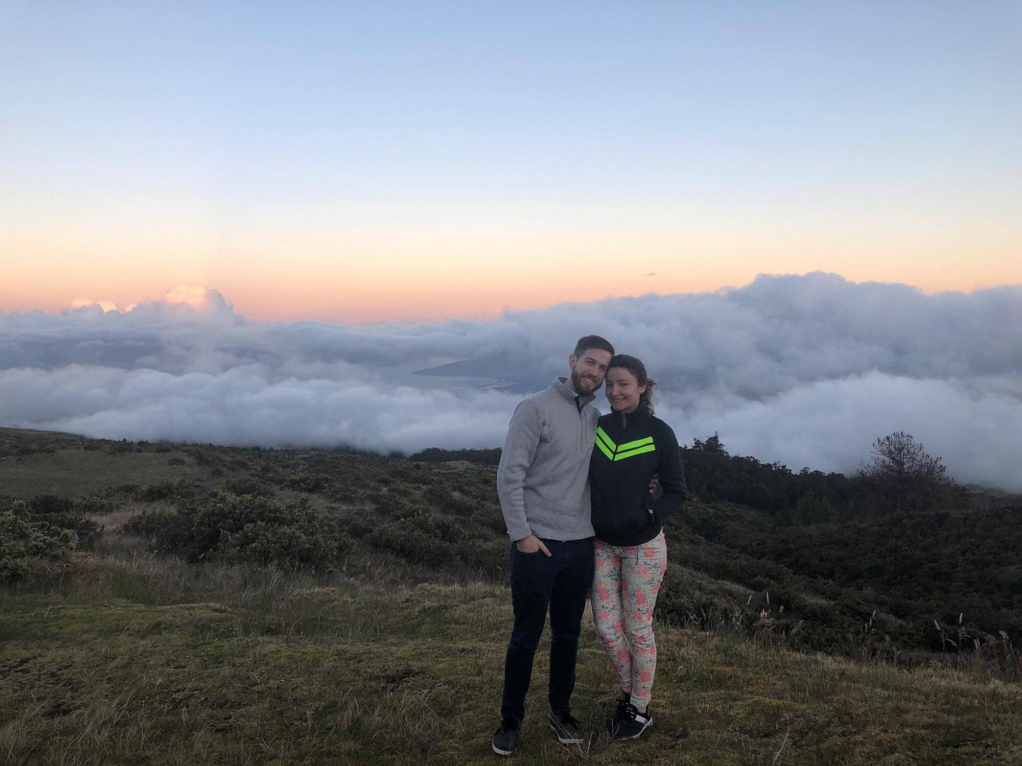 Watching the sunrise above the clouds at Haleakala in Maui.