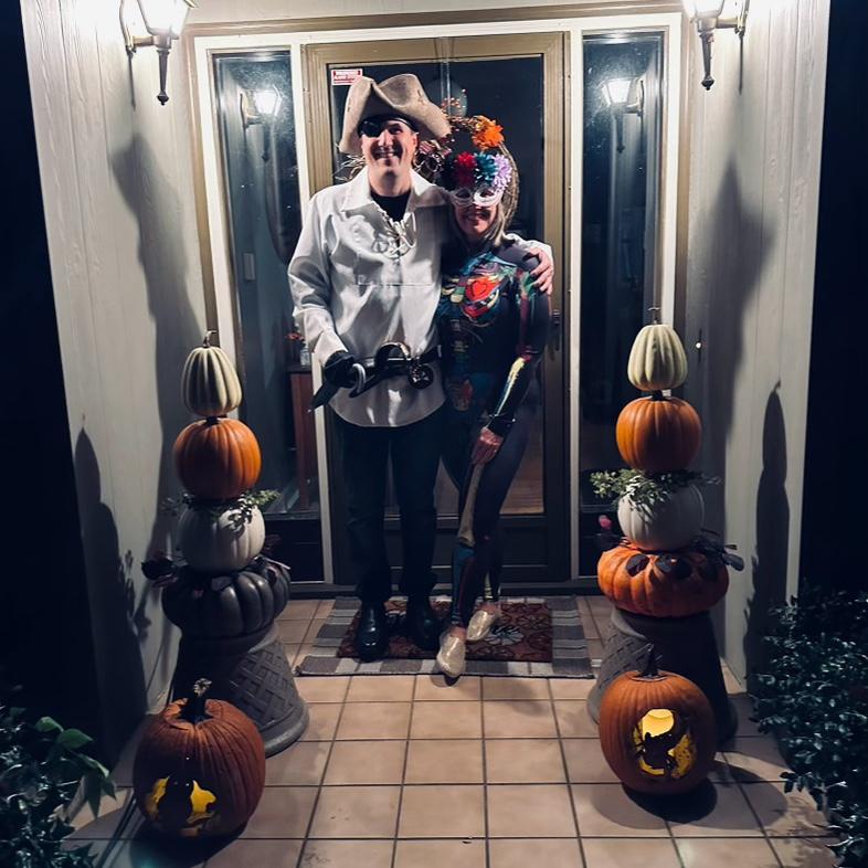 Happy Halloween from the Pirate and the Sugar Skull.  Check out our pumpkin carving skills!