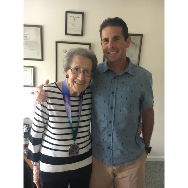 Matthew with his Grandmother, Nana, after he finished the Lake Place Ironman in NY. She will be dearly missed on our wedding day.