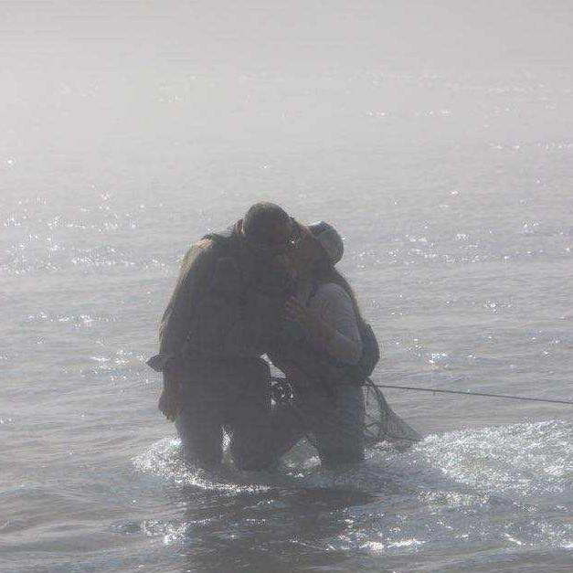 Foggy July morning fly fishing when we got engaged!